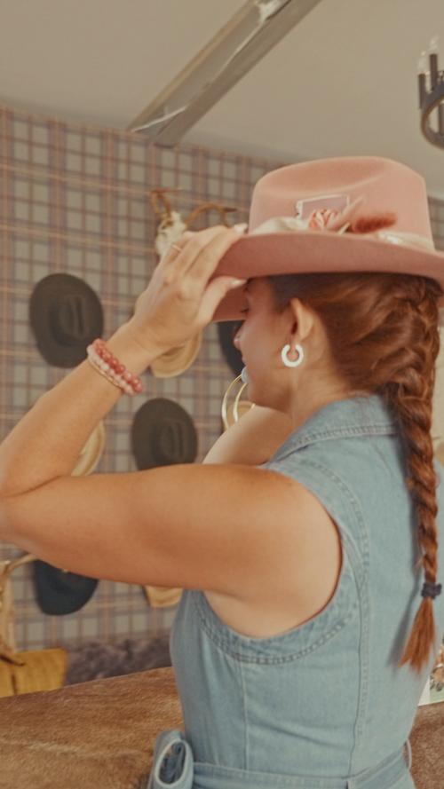 Frame from Jake Mizell's film of the Three23 Hat Bar in Round Top, Texas